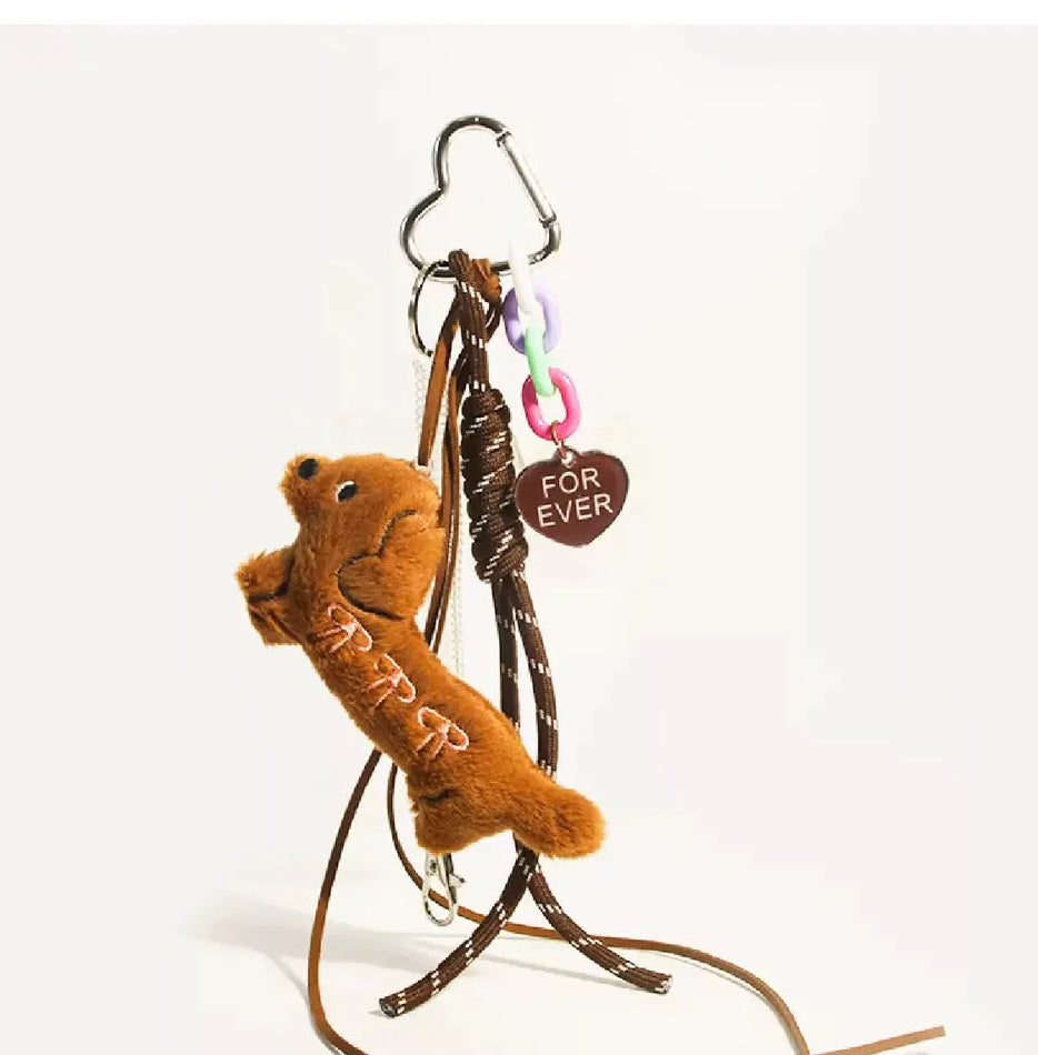 Pendentif pour sac – teckel mignon avec nœud papillon marron foncé
