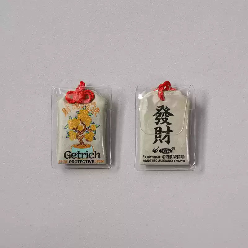 Pendentif porte-bonheur – “Quatre symboles”, dieu de la prospérité et du commerce