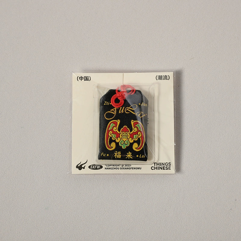 Pendentif porte-bonheur – “Quatre symboles”, dieu de la prospérité et du commerce